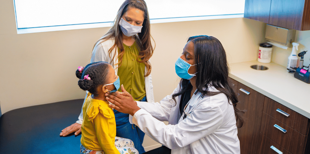 Physician checking the child